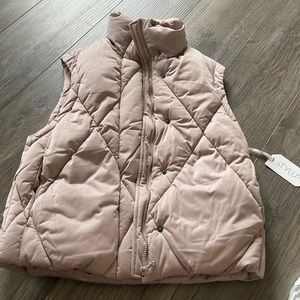 Brand new Stylus vest
